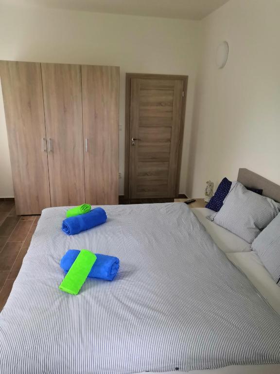 Łóżko lub łóżka w pokoju w obiekcie Penzion Na Farmě
