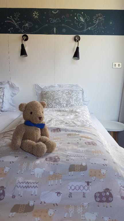Postel nebo postele na pokoji v ubytování Móra guesthouse