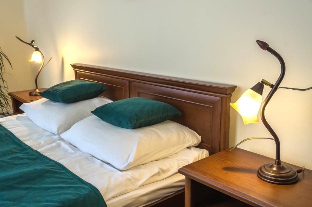 Posteľ alebo postele v izbe v ubytovaní Apartament Żychoniówka