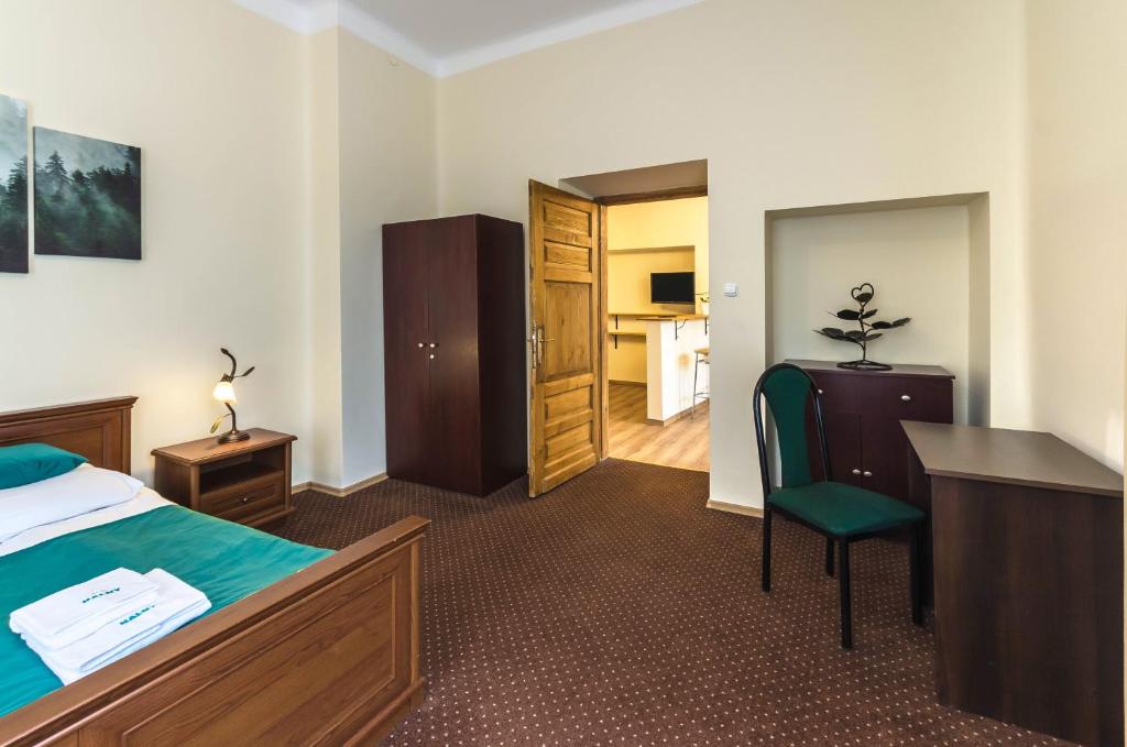 Posteľ alebo postele v izbe v ubytovaní Apartament Żychoniówka