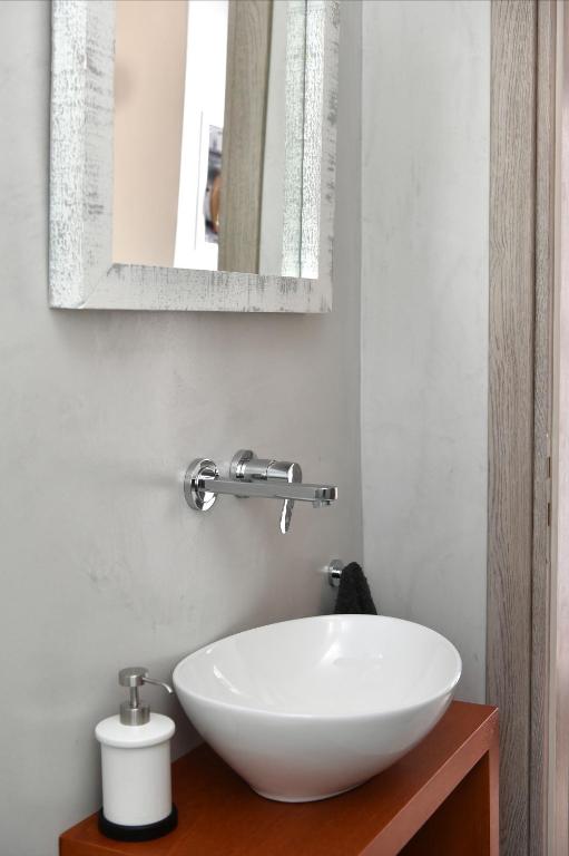 Kúpeľňa v ubytovaní Iresma Suites