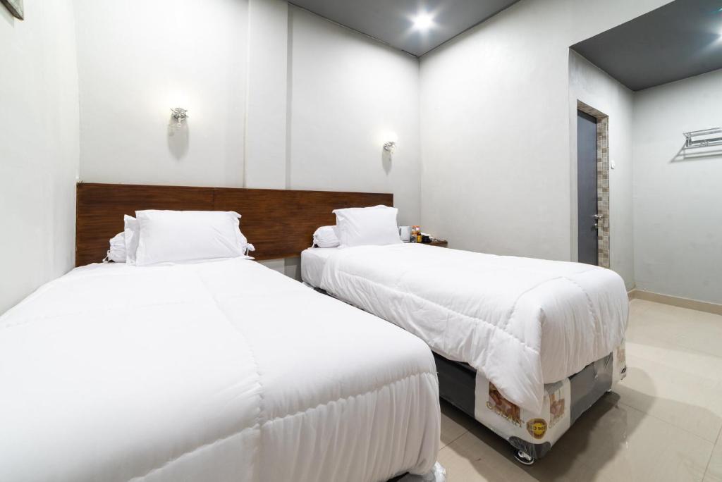 Postel nebo postele na pokoji v ubytování Glamour Hotel and Spa