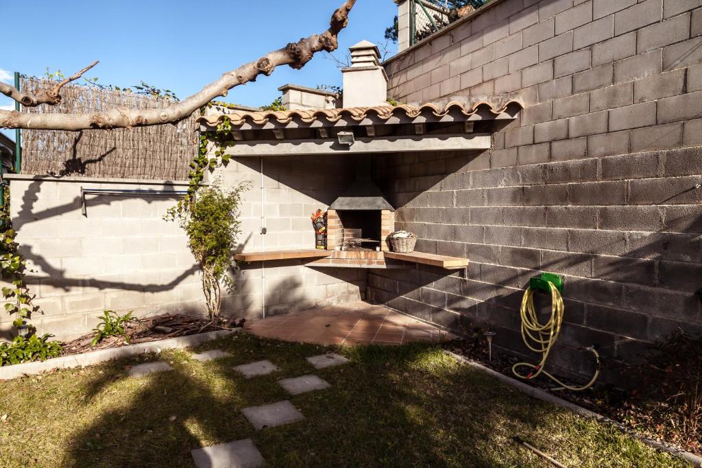 Vonkajšia záhrada v ubytovaní CASA CON JARDIN-WIFI FREE