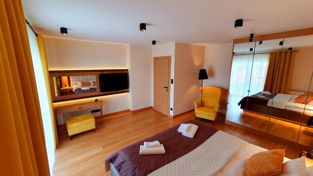 Postel nebo postele na pokoji v ubytování West Guest House