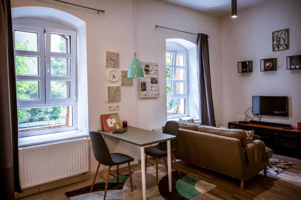 TV a/nebo společenská místnost v ubytování Bingo Apartman