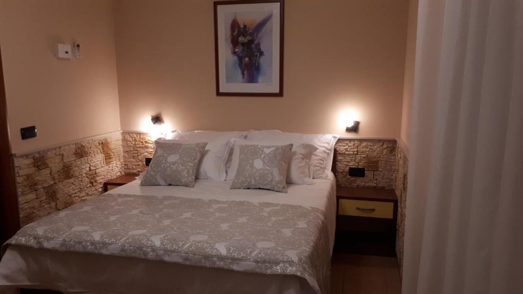 Postel nebo postele na pokoji v ubytování Dalmacija