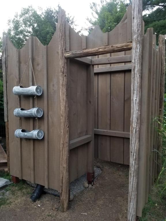 a wooden fence with at Four Ninety Muskoka B & B in Gravenhurst