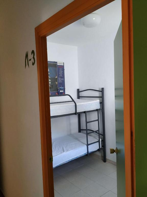 Posteľ alebo postele v izbe v ubytovaní Albergue de San Jose