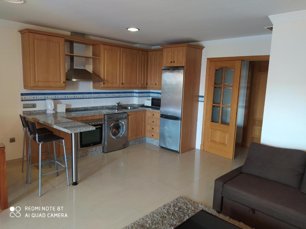 Kuchyň nebo kuchyňský kout v ubytování Estupendo apartamento con vistas al mar