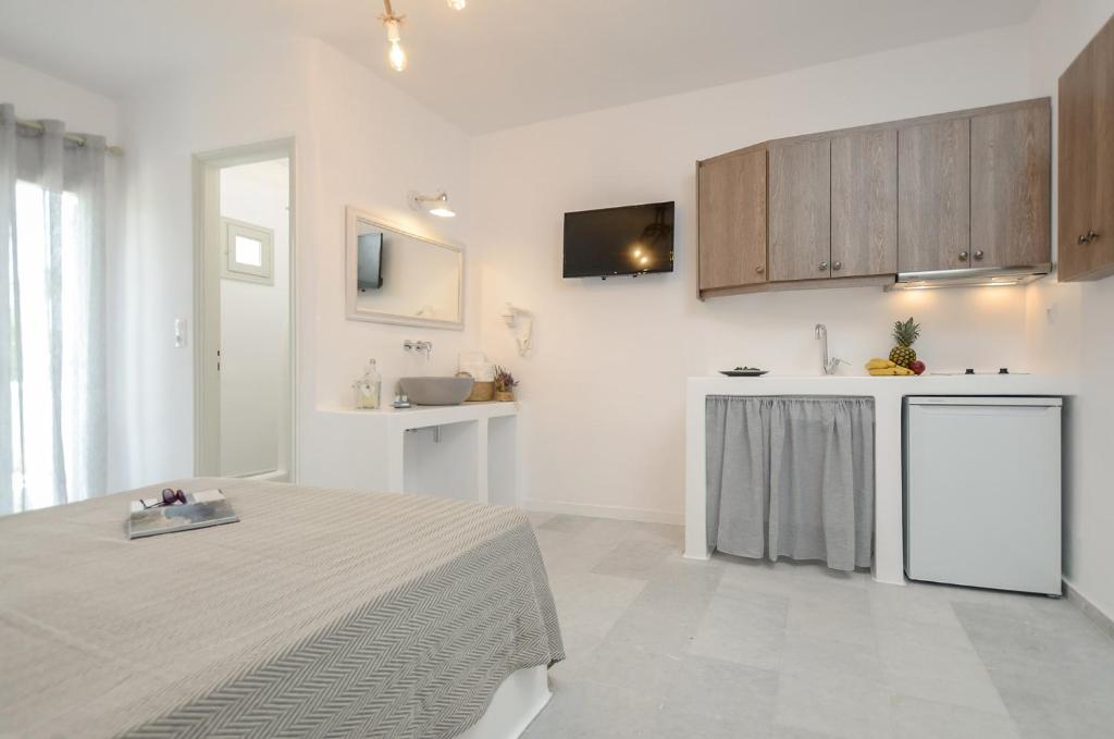 Kuchyň nebo kuchyňský kout v ubytování Casa Verde Di Naxos