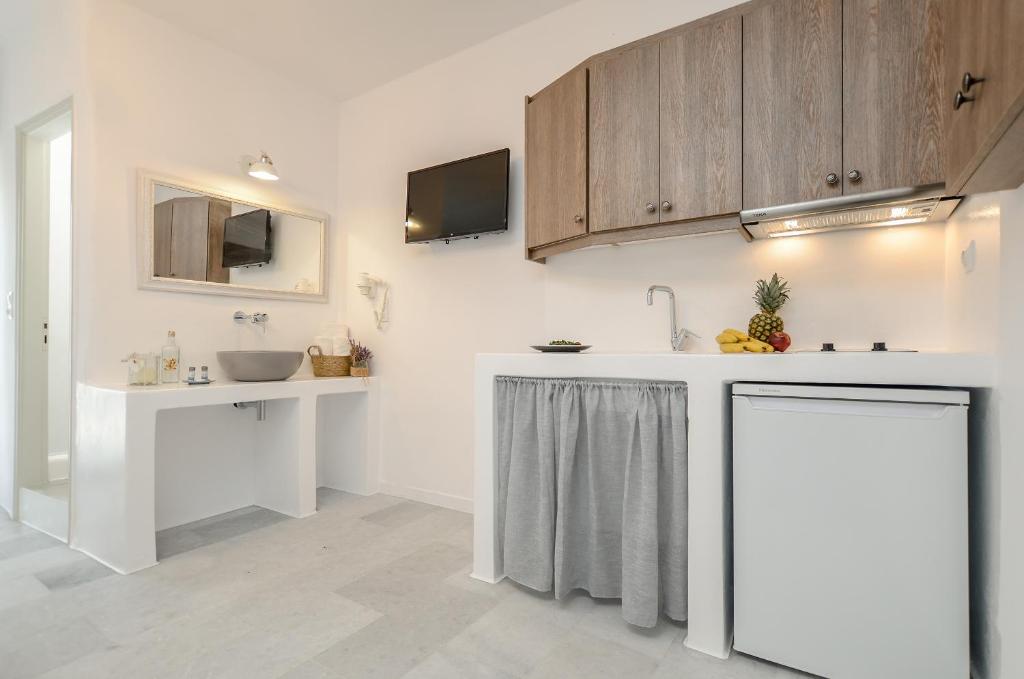 Kuchyň nebo kuchyňský kout v ubytování Casa Verde Di Naxos