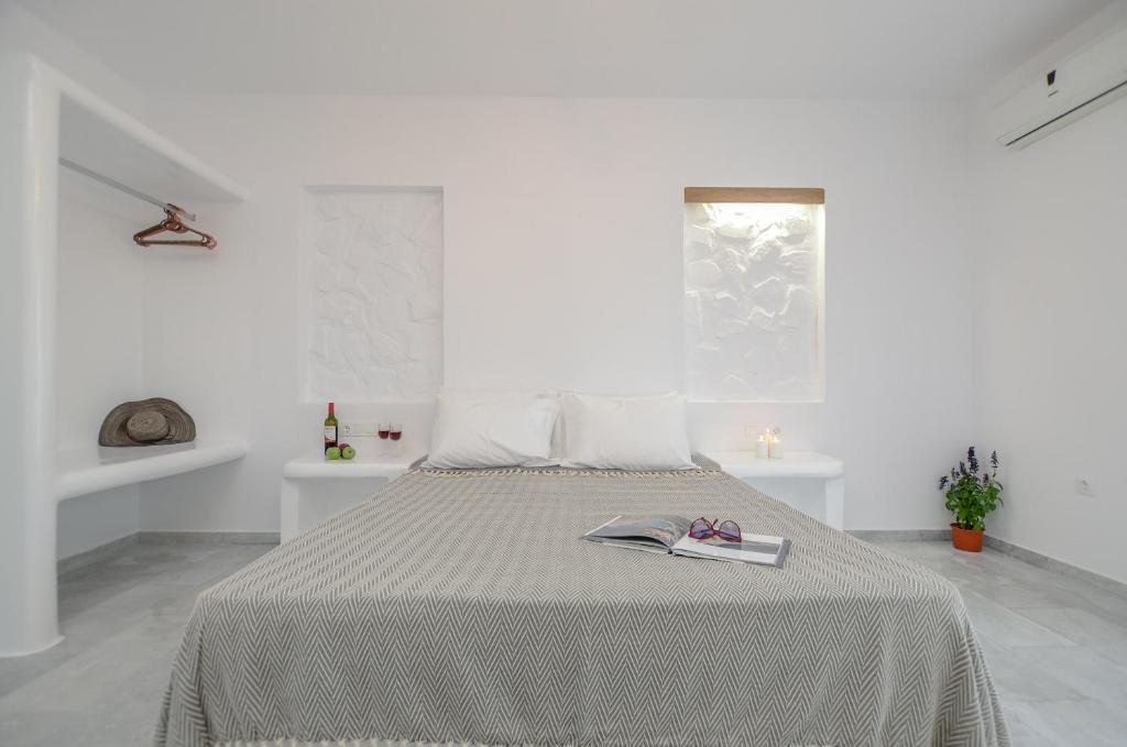 Postel nebo postele na pokoji v ubytování Casa Verde Di Naxos