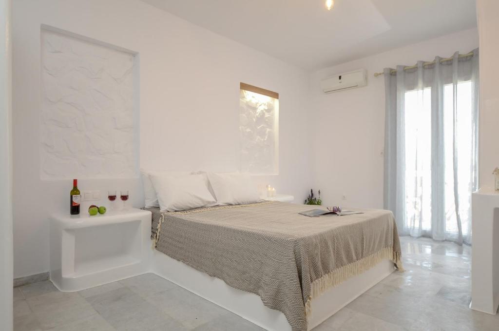 Postel nebo postele na pokoji v ubytování Casa Verde Di Naxos