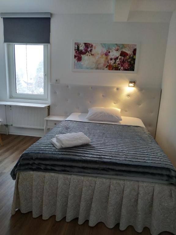 Postel nebo postele na pokoji v ubytování Bed and Breakfast Am Knittenberg