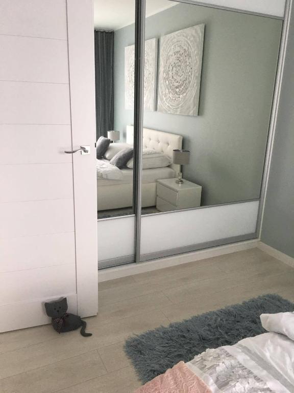 Posteľ alebo postele v izbe v ubytovaní Studio 33 z Ogrodem