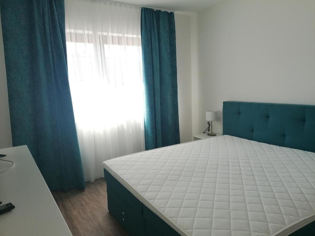 Postel nebo postele na pokoji v ubytování Catalleya Haus