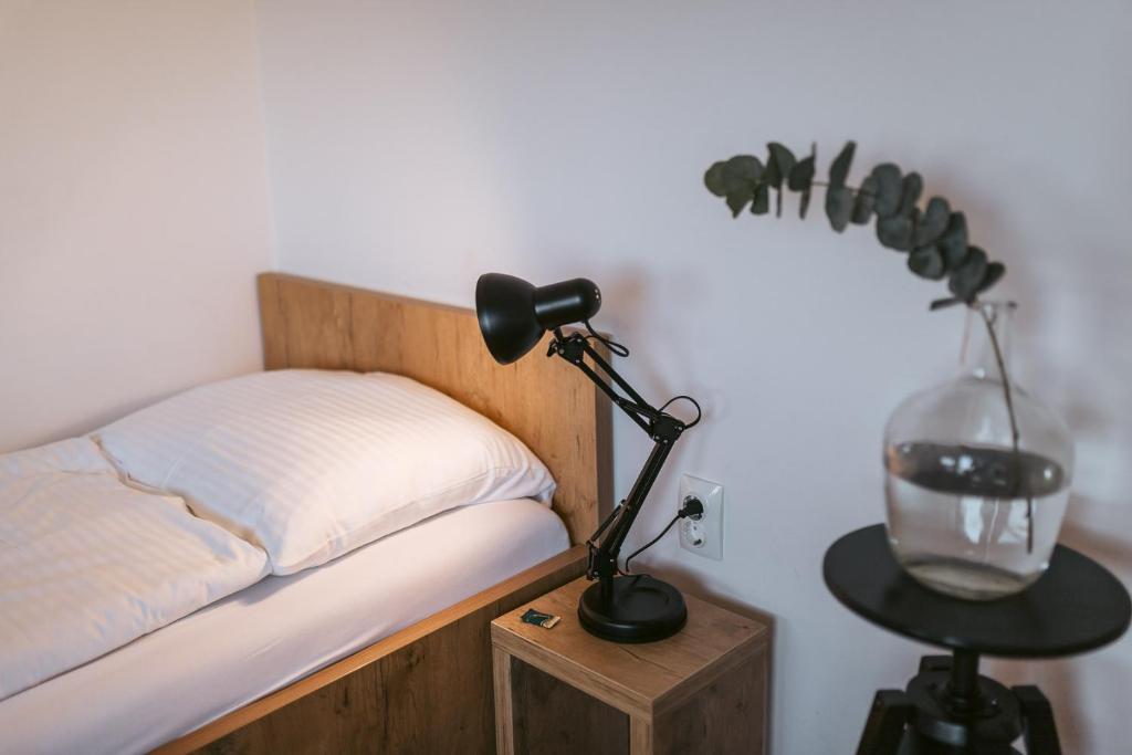 Postel nebo postele na pokoji v ubytování Pri Karlu Rooms & More