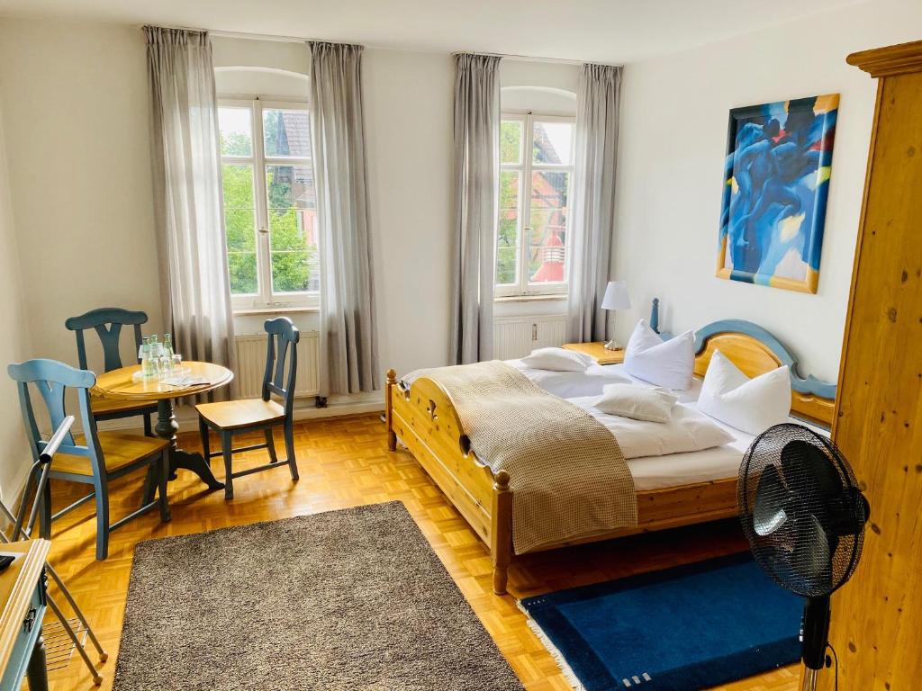 Un pat sau paturi într-o cameră la Zur Kapelle