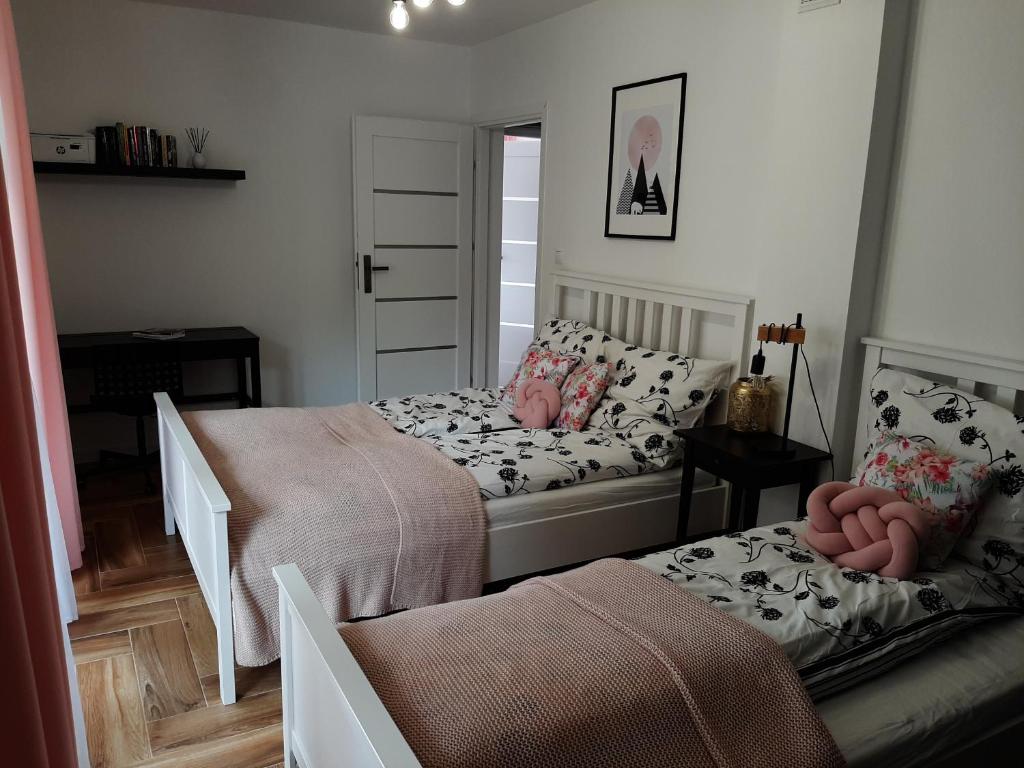 Posteľ alebo postele v izbe v ubytovaní Apartament Gaia