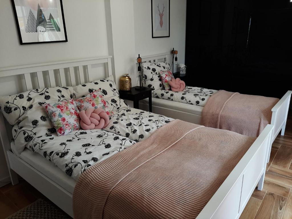 Posteľ alebo postele v izbe v ubytovaní Apartament Gaia