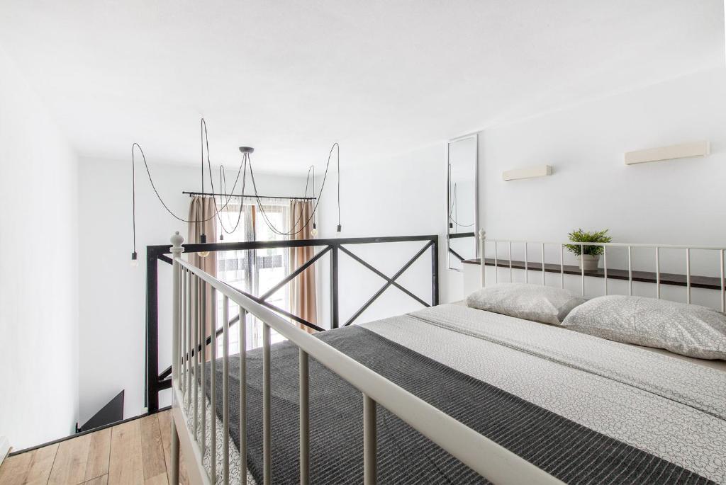 Posteľ alebo postele v izbe v ubytovaní Smart Rental Management Apartments - CITY CENTER