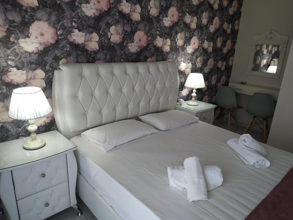 Un pat sau paturi într-o cameră la Apartment Julia