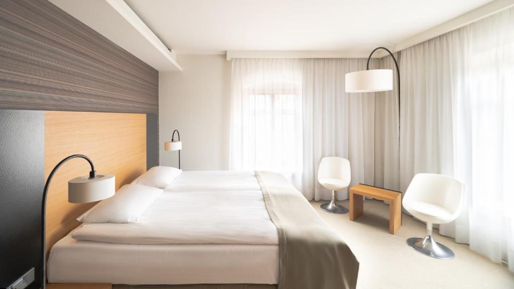 Postel nebo postele na pokoji v ubytování Hotel Bulwar