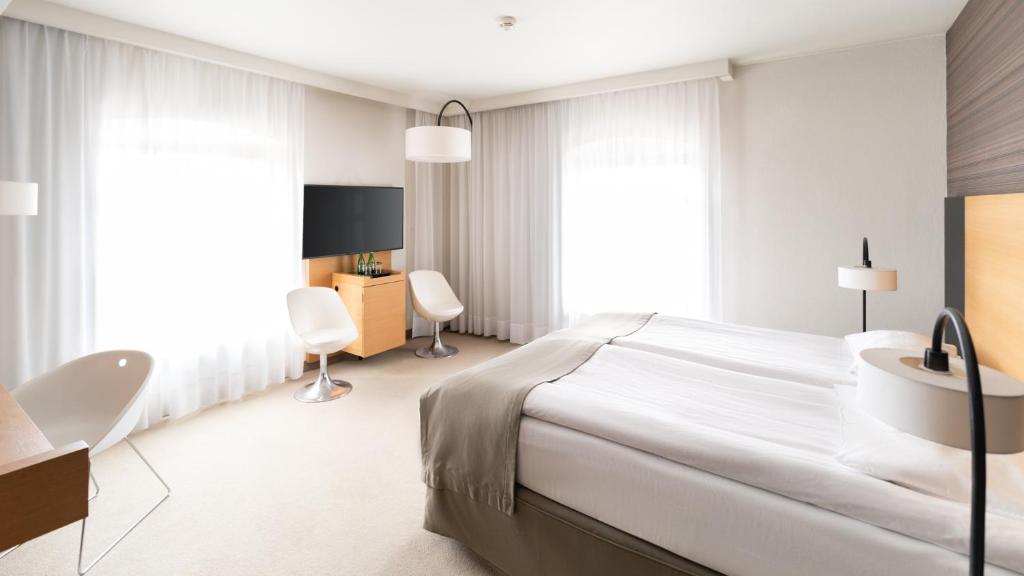 Postel nebo postele na pokoji v ubytování Hotel Bulwar