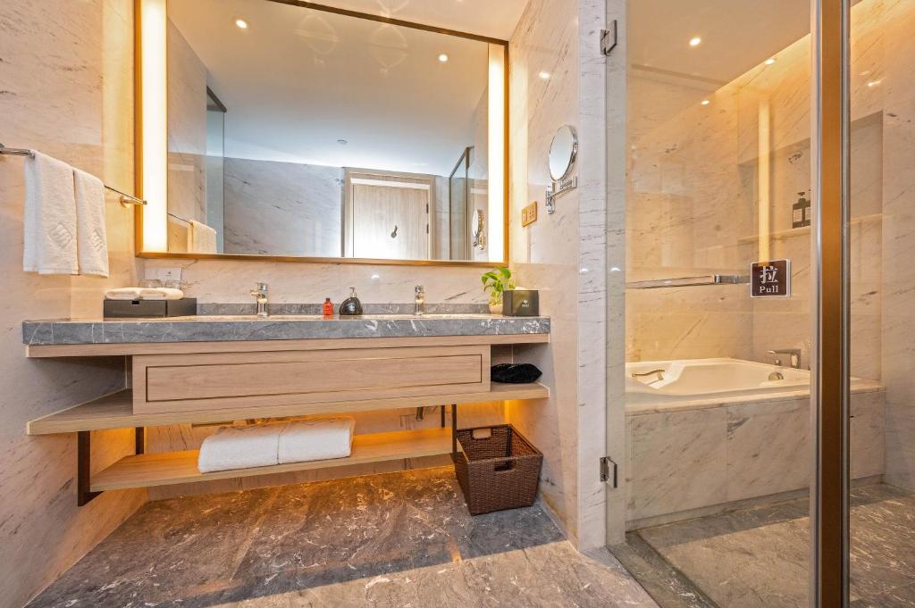 Koupelna v ubytování Nanan Ao Sheng Yi Hao Hotel