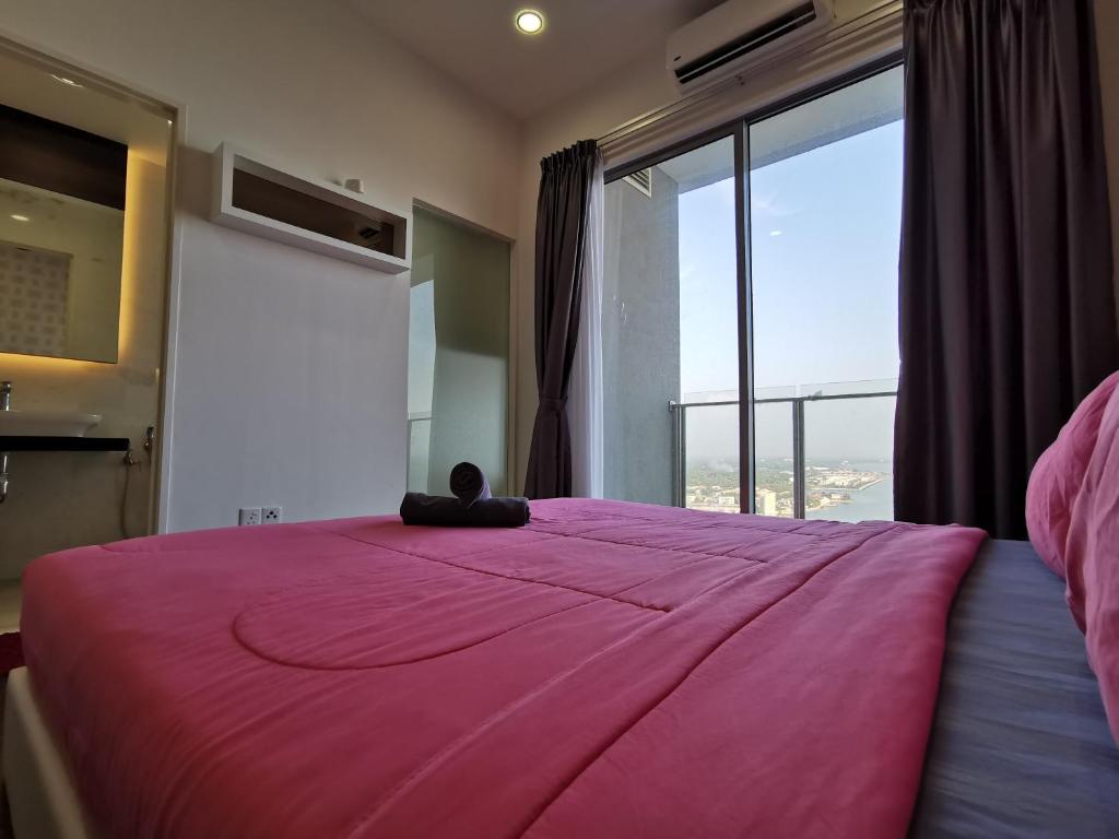 Postel nebo postele na pokoji v ubytování Thermospace Silverscape A-19-01 Melaka City