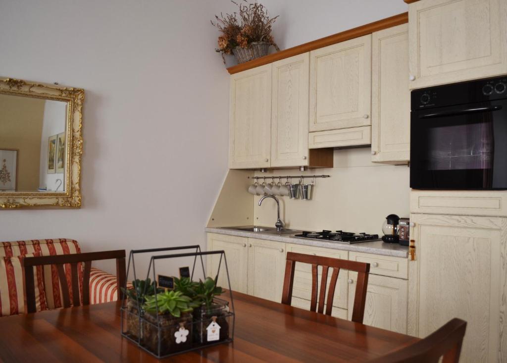 A kitchen or kitchenette at My Suite Home - Riva del Garda