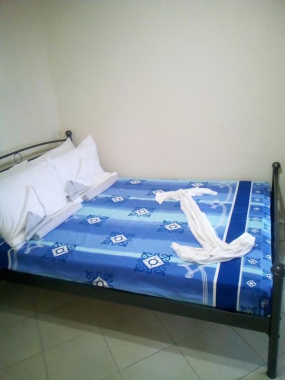 Postel nebo postele na pokoji v ubytování Navy House