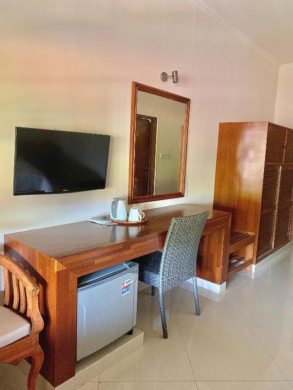 TV a/nebo společenská místnost v ubytování Fat Yogi Cottages