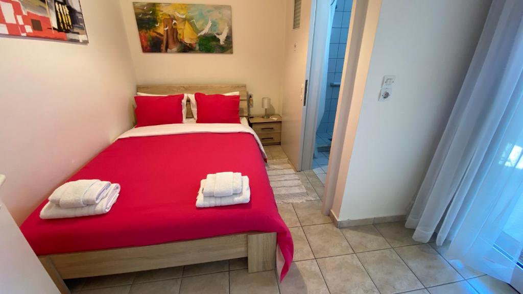 Posteľ alebo postele v izbe v ubytovaní Patras Port apartment