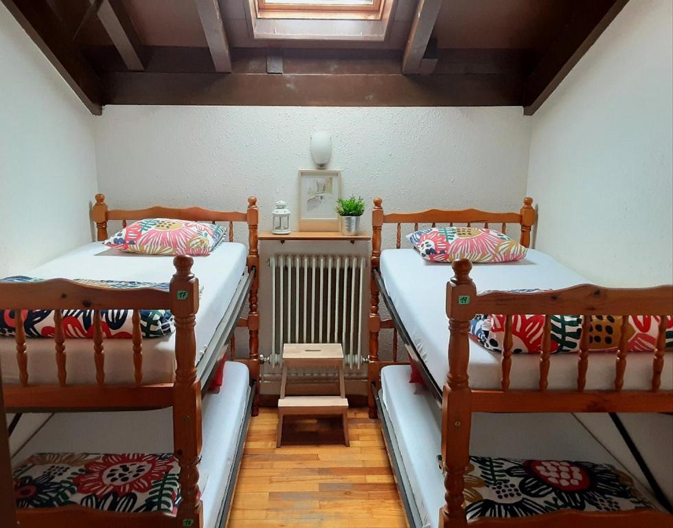 Postel nebo postele na pokoji v ubytování Refugio La Ardilla Real