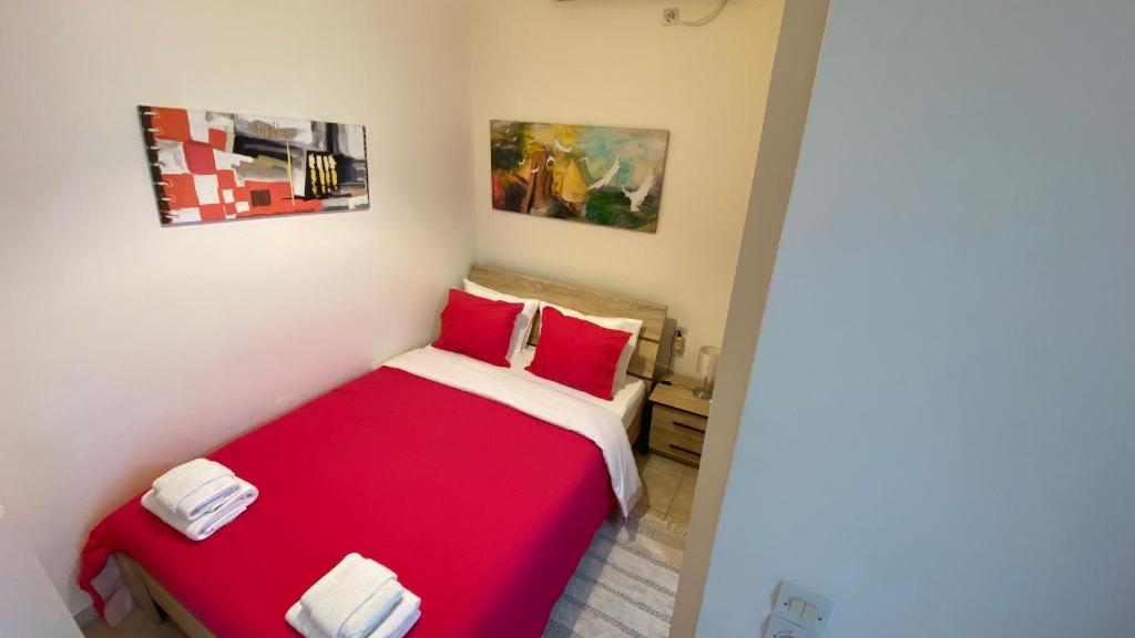 Posteľ alebo postele v izbe v ubytovaní Patras Port apartment