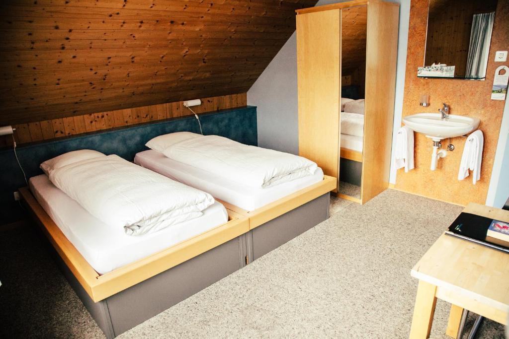 Postel nebo postele na pokoji v ubytování Seminarhotel Lihn
