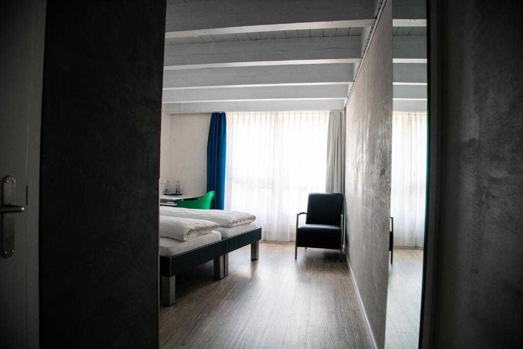 Postel nebo postele na pokoji v ubytování Seminarhotel Lihn