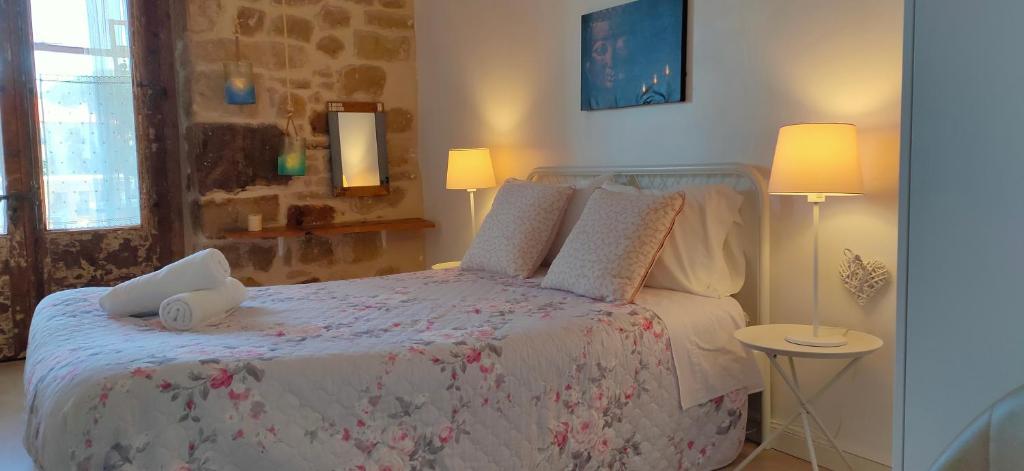 Postel nebo postele na pokoji v ubytování Albergue Valderrobres Auto check-in