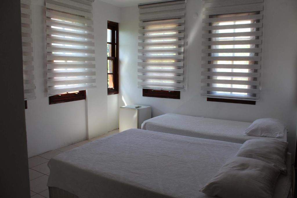 Ένα ή περισσότερα κρεβάτια σε δωμάτιο στο White City Pension