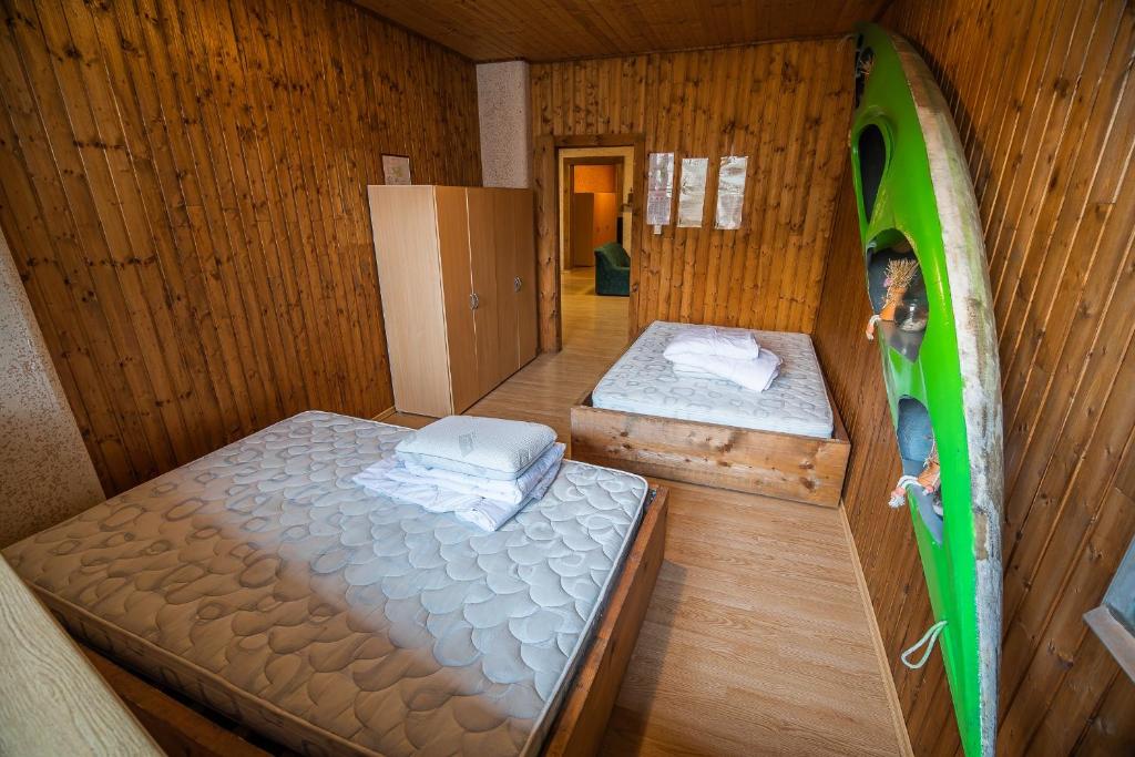 Postel nebo postele na pokoji v ubytování Hostel Paradiso