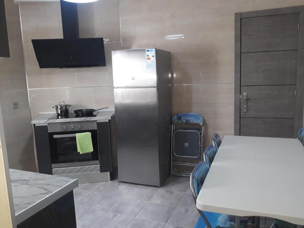 A kitchen or kitchenette at Apartamento barbadiel Nocedo-n 11