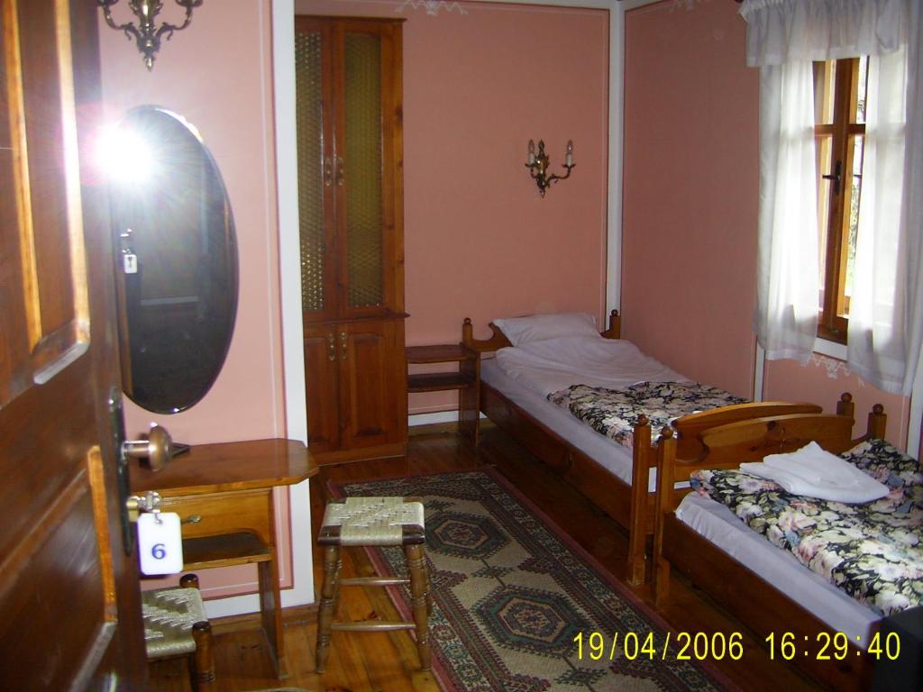 Postel nebo postele na pokoji v ubytování Family Hotel Kalina