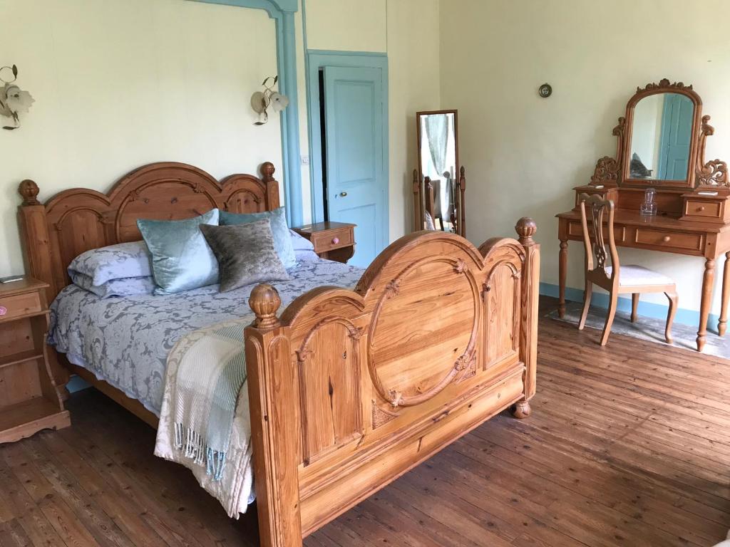 Postel nebo postele na pokoji v ubytování Chambres d'Hôtes Belle Vallee