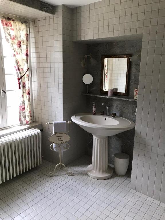 Koupelna v ubytování Chambres d'Hôtes Belle Vallee
