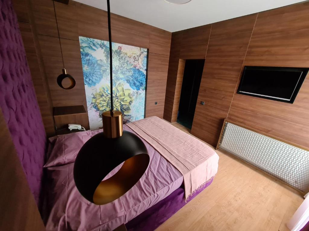 Postel nebo postele na pokoji v ubytování Hotel Zeleni Vir