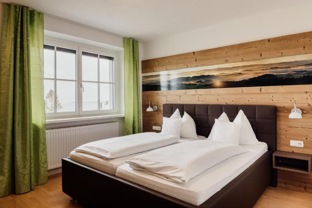 Postel nebo postele na pokoji v ubytování Pension Panoramablick