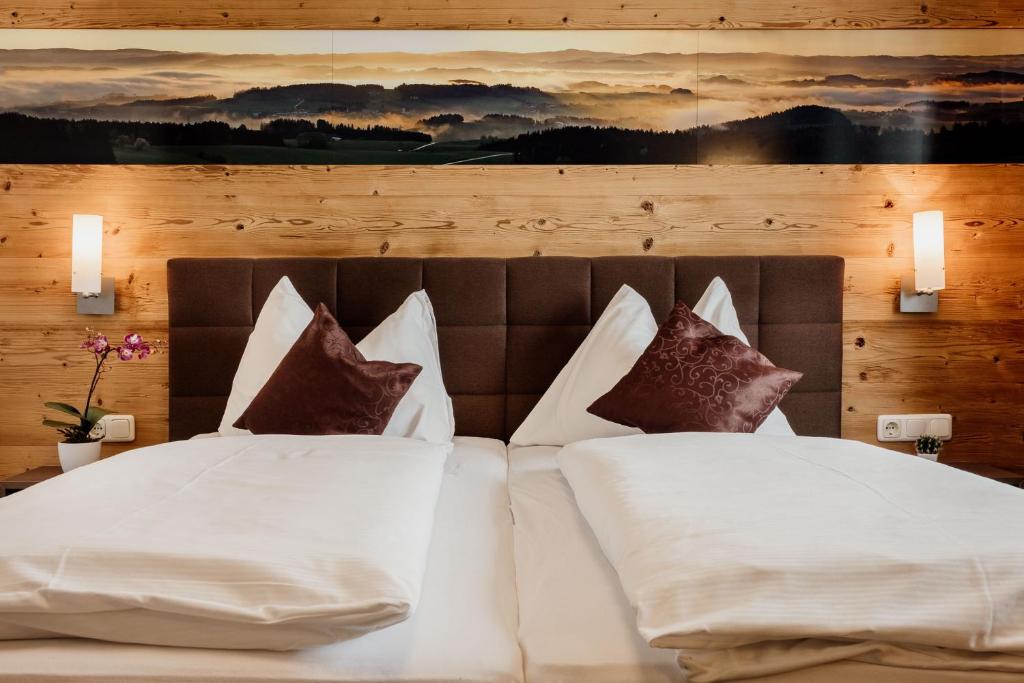 Postel nebo postele na pokoji v ubytování Pension Panoramablick