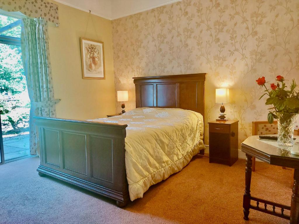 Letto o letti in una camera di Belvedere Lodge