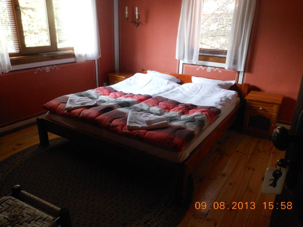 Postel nebo postele na pokoji v ubytování Family Hotel Kalina